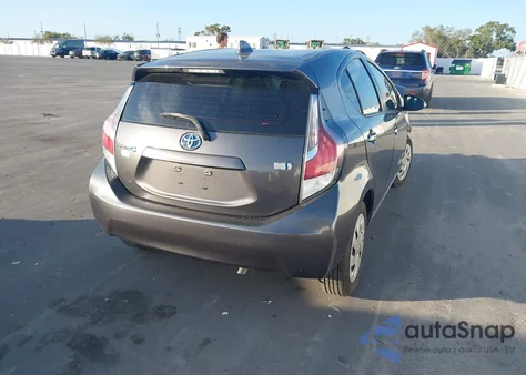 2016 Toyota Prius C One from USA, damaged, VIN JTDKDTB38G1124057